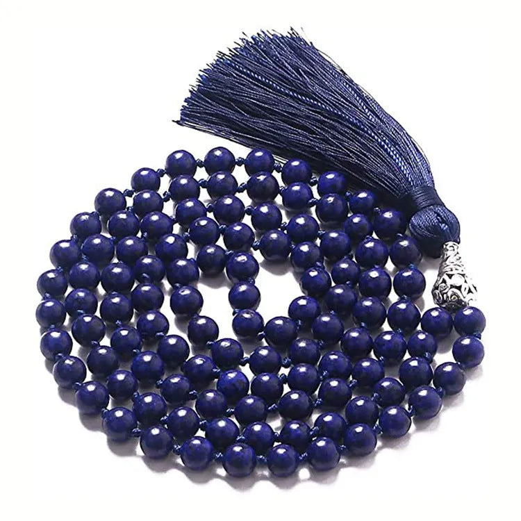 Long multicoloured agate and gemstone tassel necklace with geometric beads.