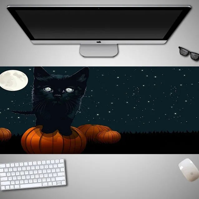 Oversized Halloween-themed mouse pad with graphic design on non-slip rubber cloth surface