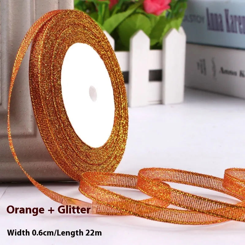 Roll of narrow 0.6cm wide polyester satin ribbon in a choice of colours, showing 22 metre length.