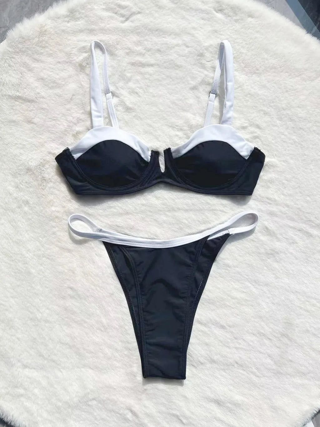 Black low waist bikini set with split stitching and brief style for women swimming