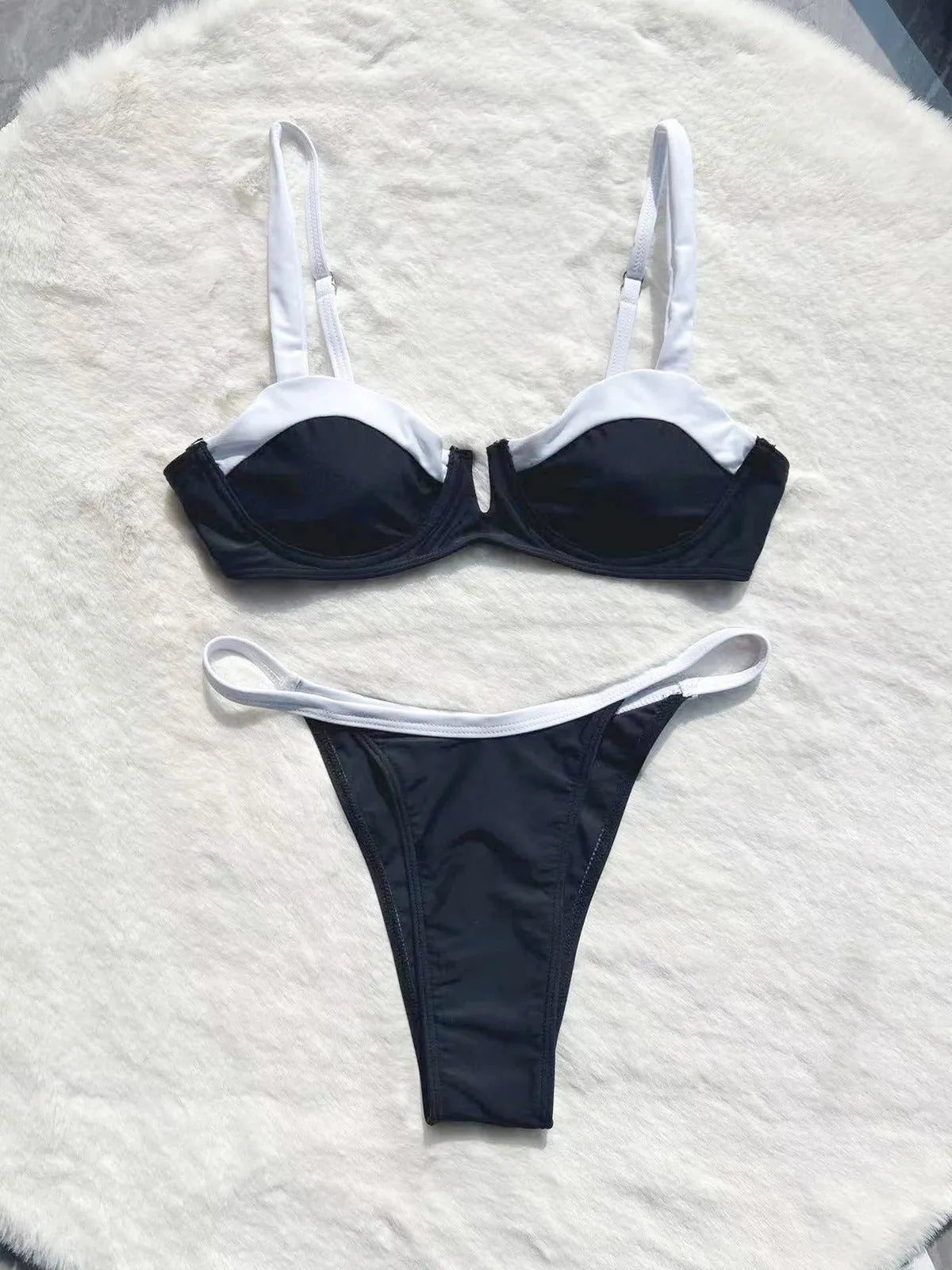 Black low waist bikini set with split stitching and brief style for women swimming
