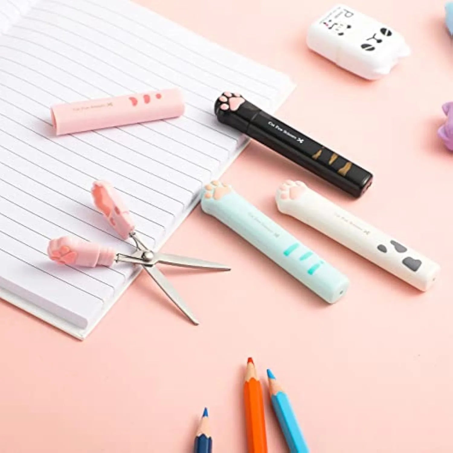 Cat paw mini folding scissors in four colours with stainless steel blades measuring 8.7 cm
