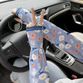 A pair of printed viscose ice silk sun protection sleeve gloves covering the forearm and elbow.