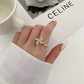 Rotating windmill ring with micro-inlaid design in gold or silver electroplated finish