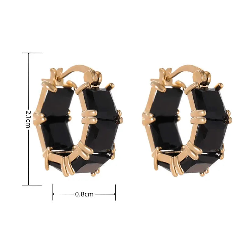 Geometric U-shaped gold earrings with round accents and black zircon stones