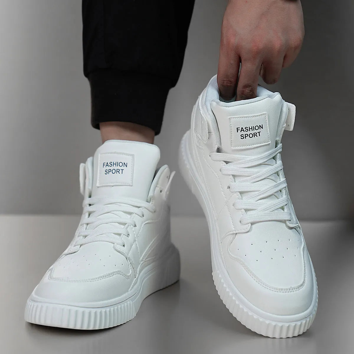 Men's white round-toe casual shoes made from microfiber material.