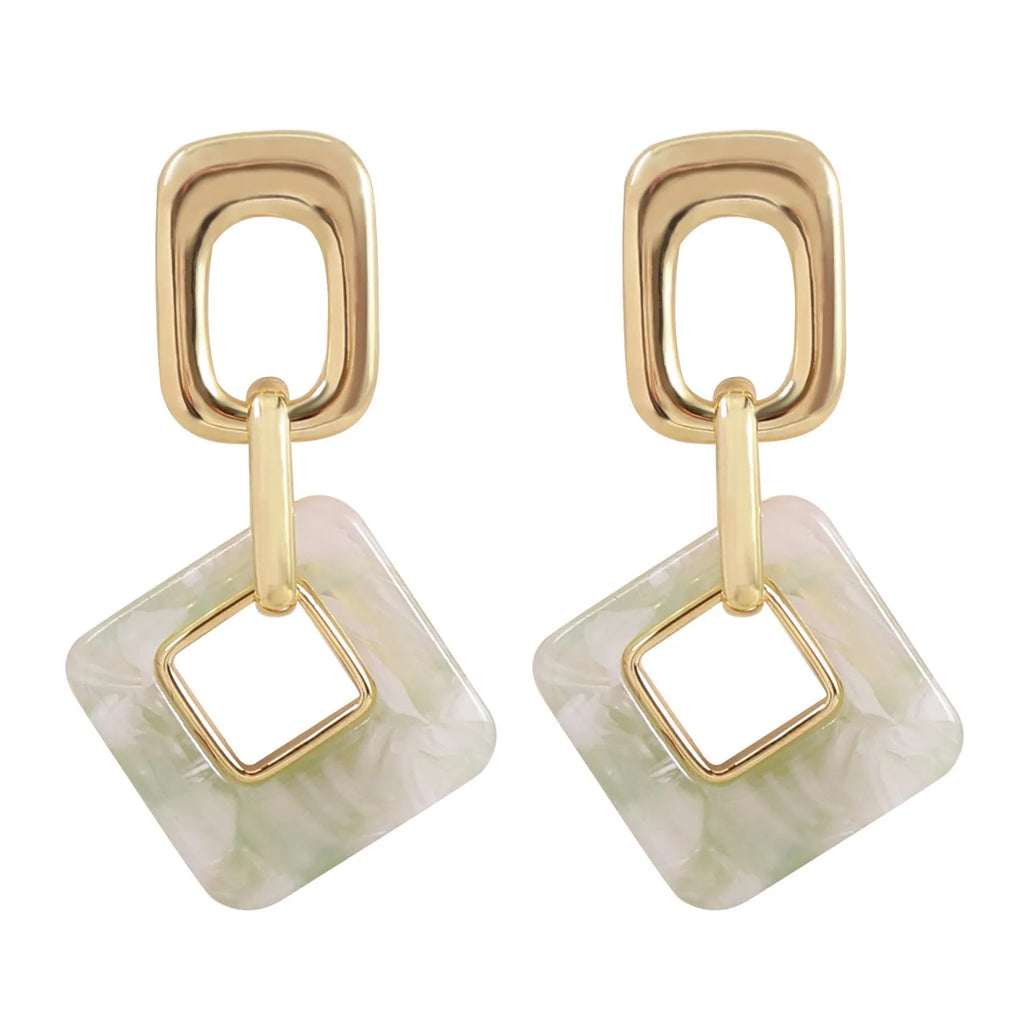 Geometric square hollow earrings with chamfered corners in electroplated copper