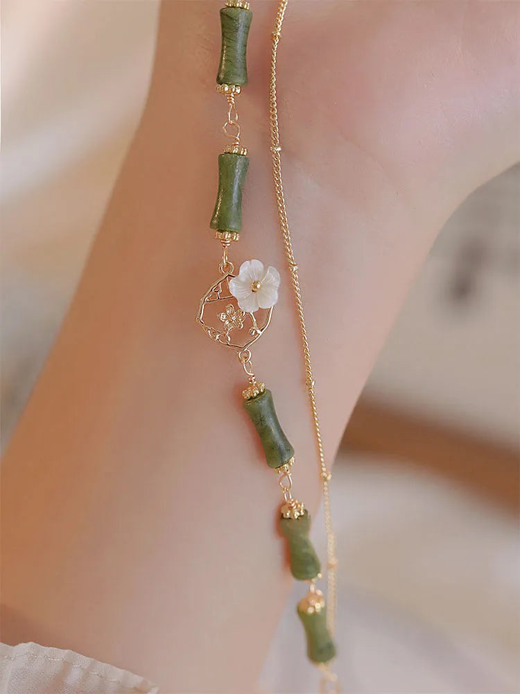 Natural olivine double layer bracelet with Bells of Ireland charms and olive branch detailing