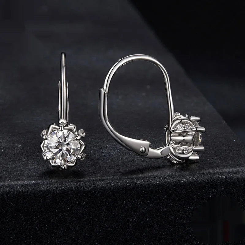 Sterling silver flower bud clip earrings with moissanite stones and white gold plating