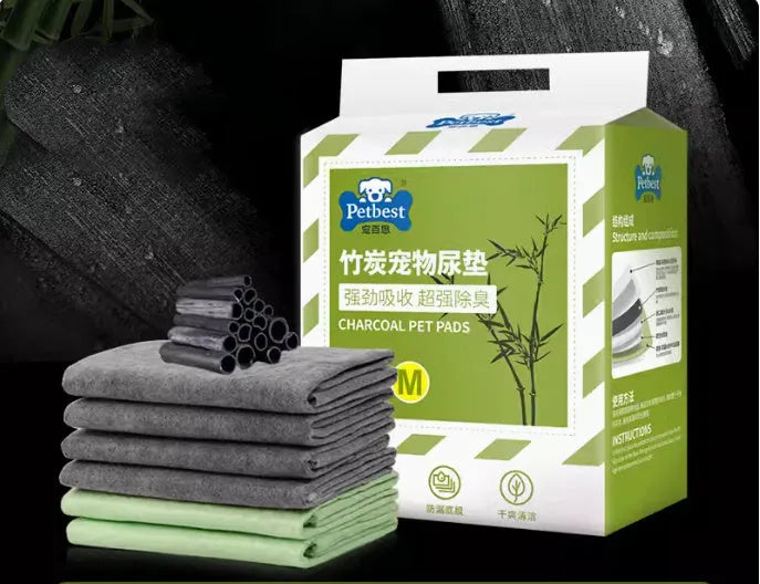 Pack of dog urine pads showing adhesive backing, bamboo charcoal variant, and size comparison