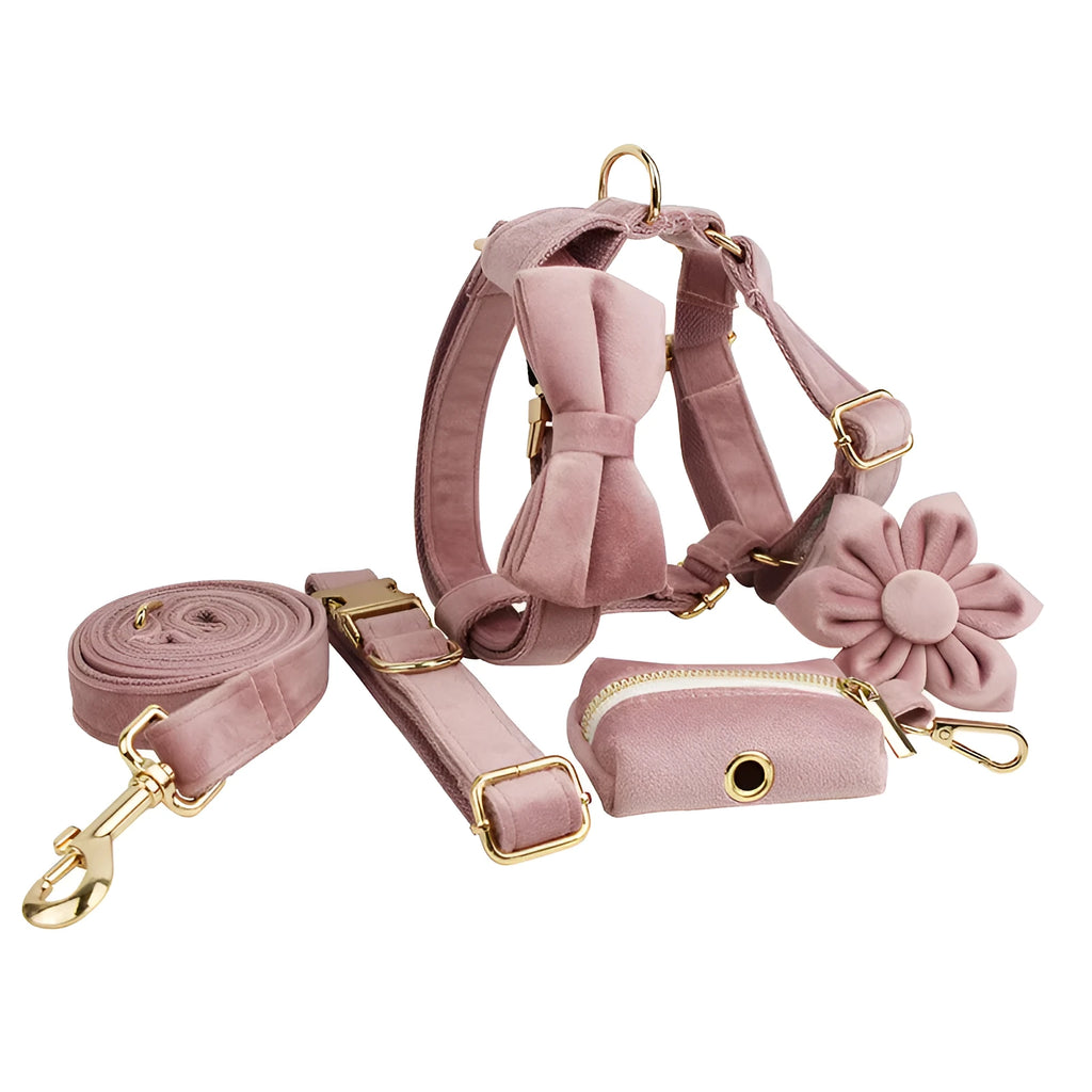 Light purple and pink velvet dog collar with matching leash and bow accessory set on a white background.