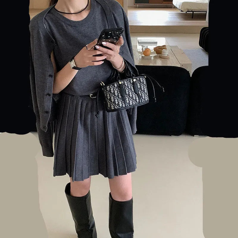 Women's grey Art Retro knitted vest skirt and long-sleeved cardigan set with pleating detail