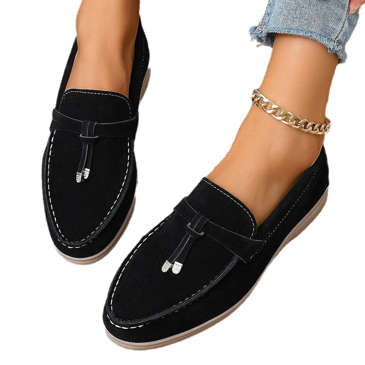 Solid colour canvas Gommino slip-on loafers with a round toe and platform heel on a rubber sole.