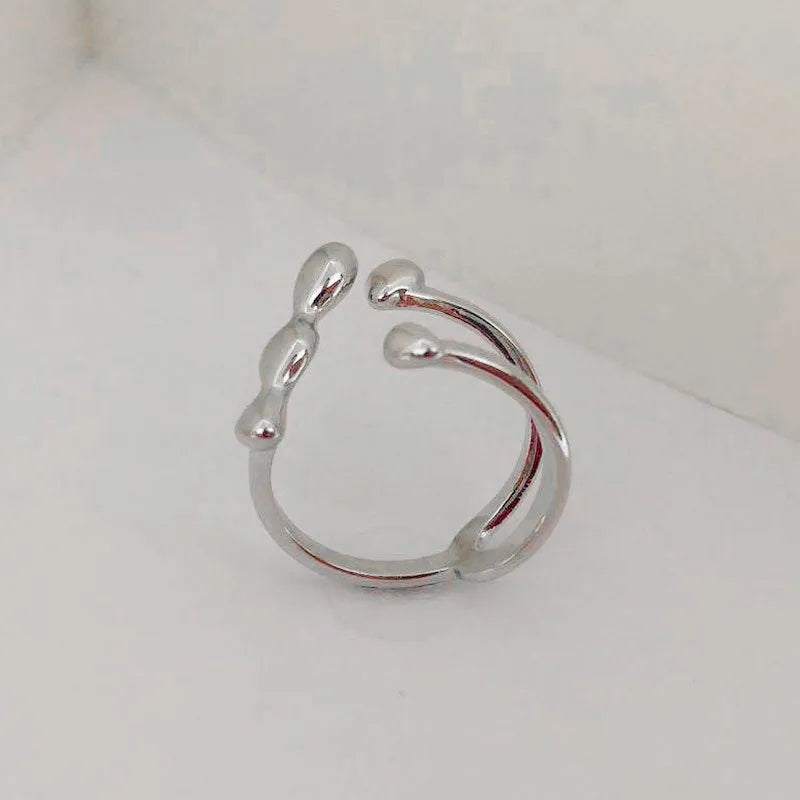 Brass women's fashion ring with spherical design in gold or silver adjustable ring