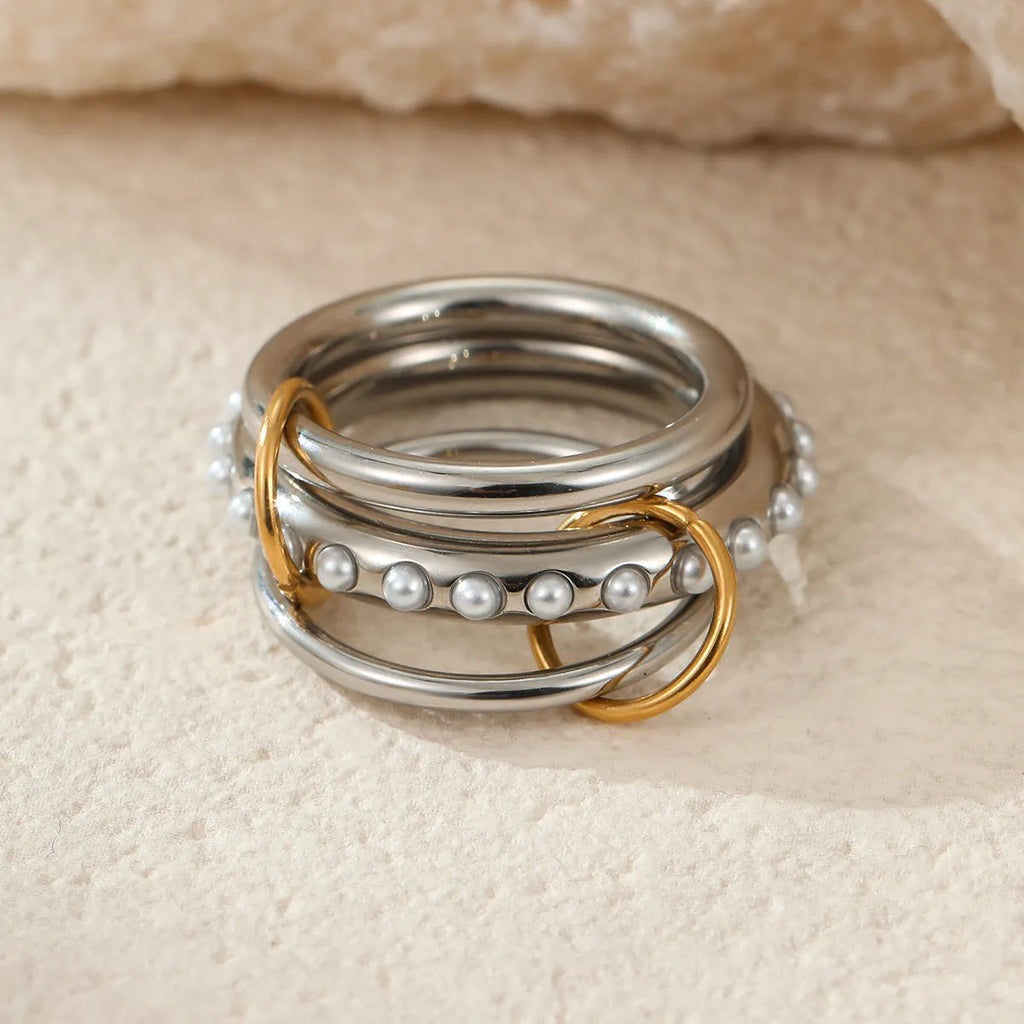 Stacked stainless steel ring set with gold plating in three colour variants