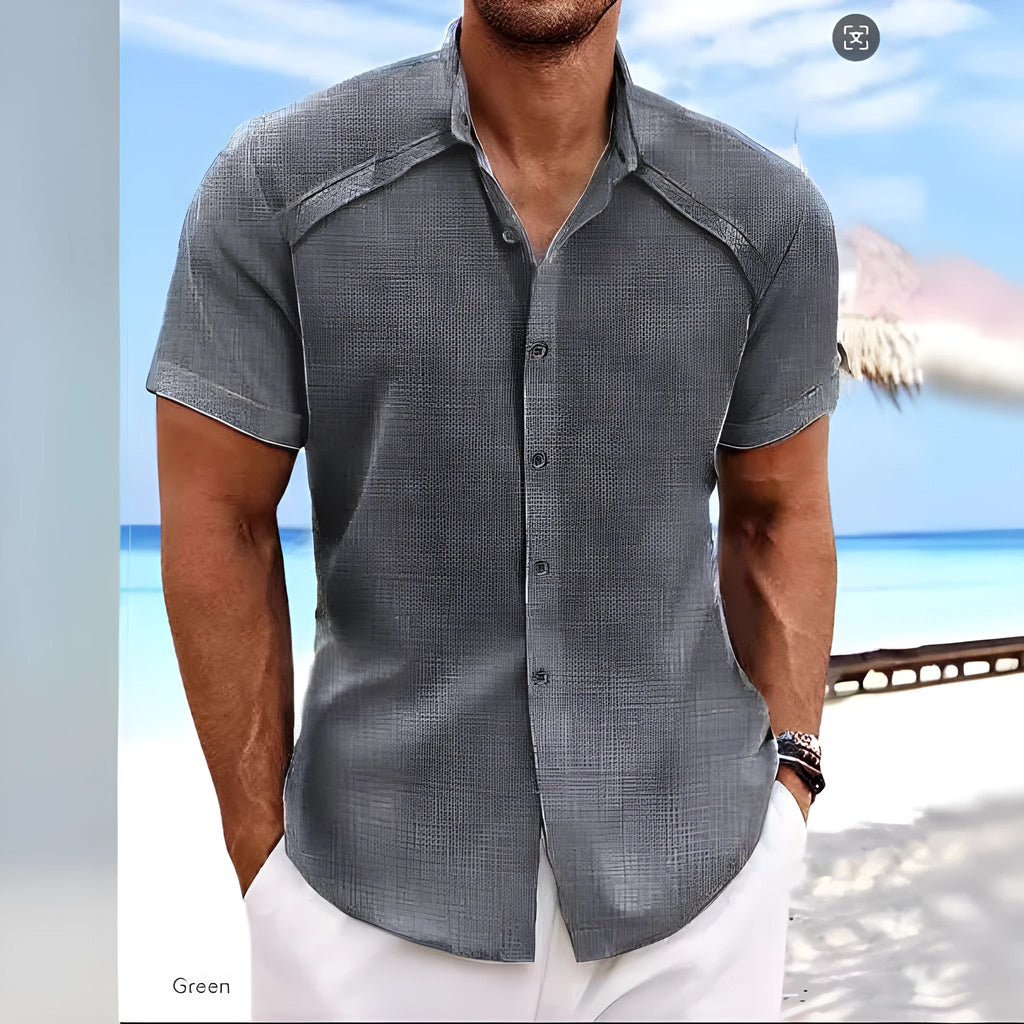 Men's solid colour short sleeve casual shirt in cotton blend fabric on a hanger.