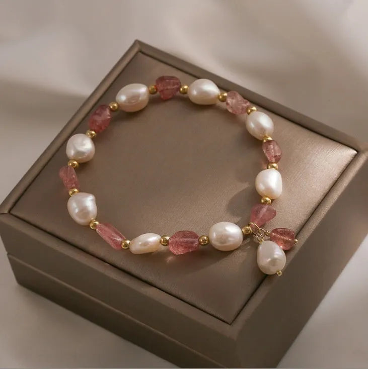Handmade natural crystal bracelet with strawberry quartz decorative elements in pearl, moon, XINGX, or green design options
