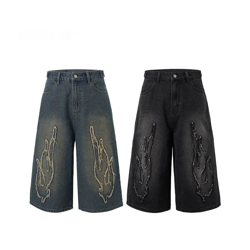 Men's black cotton denim shorts with flame embroidery patches and straight fit cut