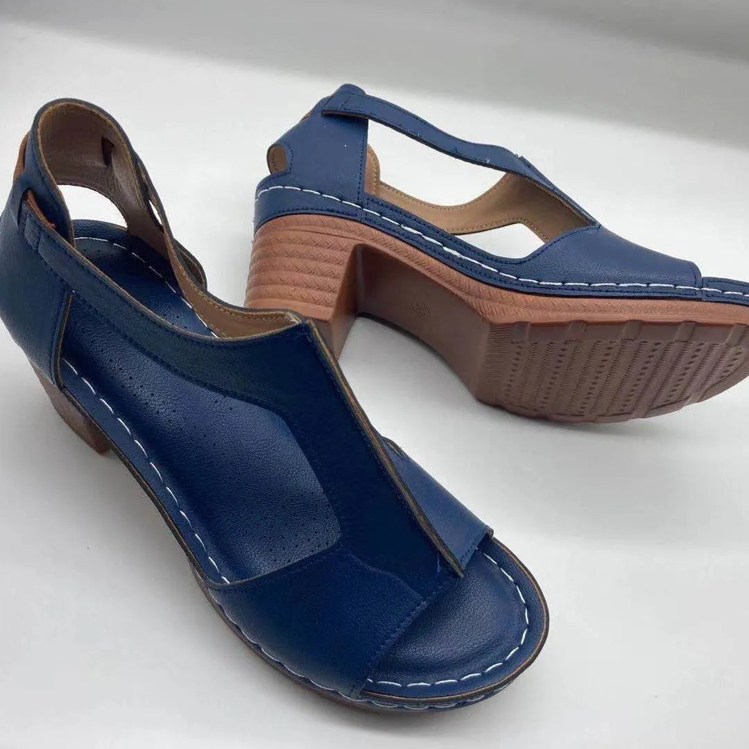 Women's peep toe wedge sandals with a buckle strap, shown in a light brown colour on a white background.