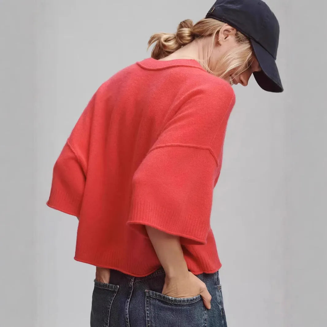 Red or white short viscose fibre T-shirt with an exposed navel cut, shown on a model.