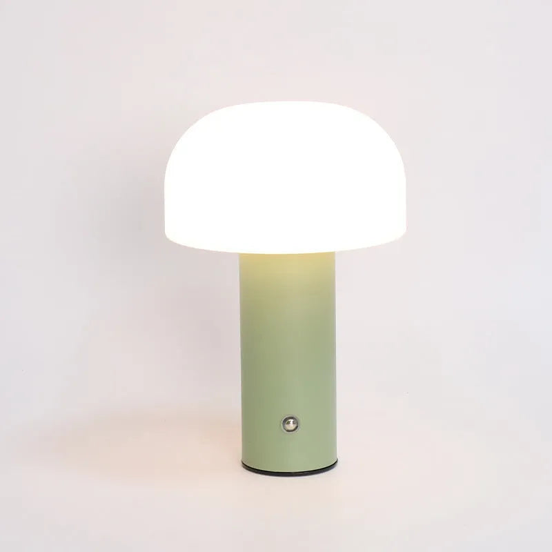 USB-powered dual-purpose table lamp providing atmospheric lighting and charging in black, green, orange, or white