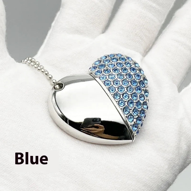 Heart-shaped brick pattern USB flash drive in blue, showing metal shell and USB connector.