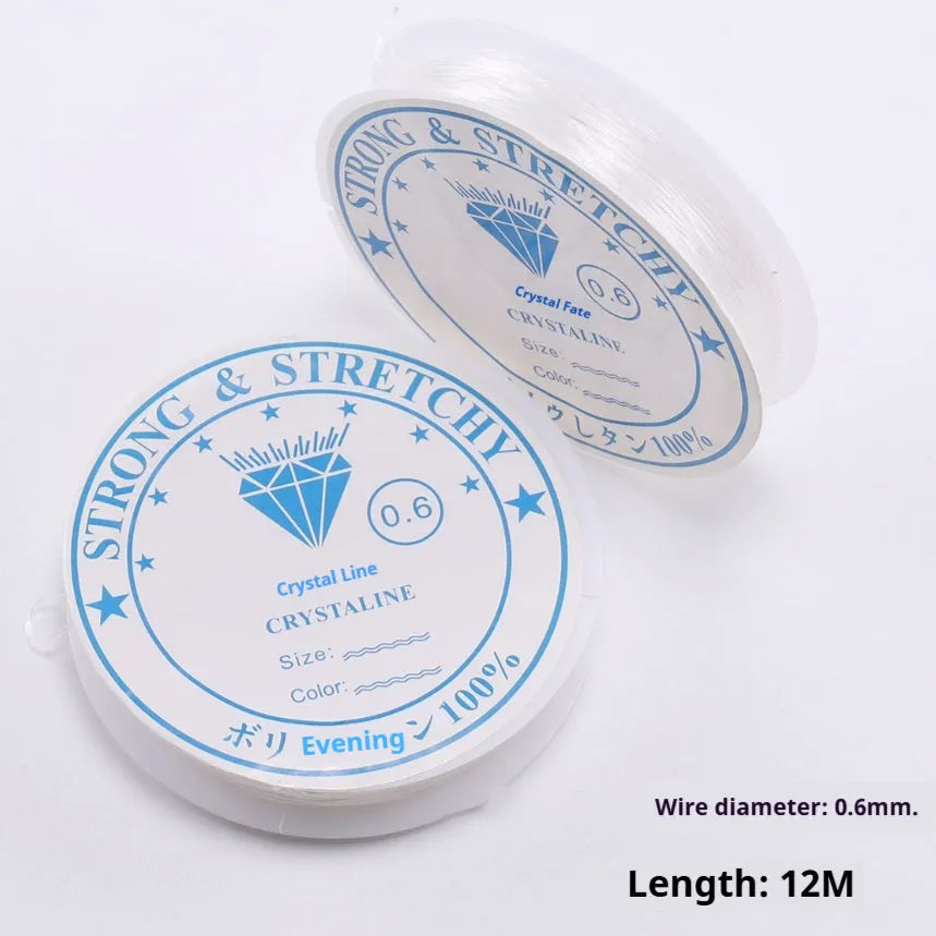 Reel of transparent white elastic fishing line for DIY crafts and jewellery.