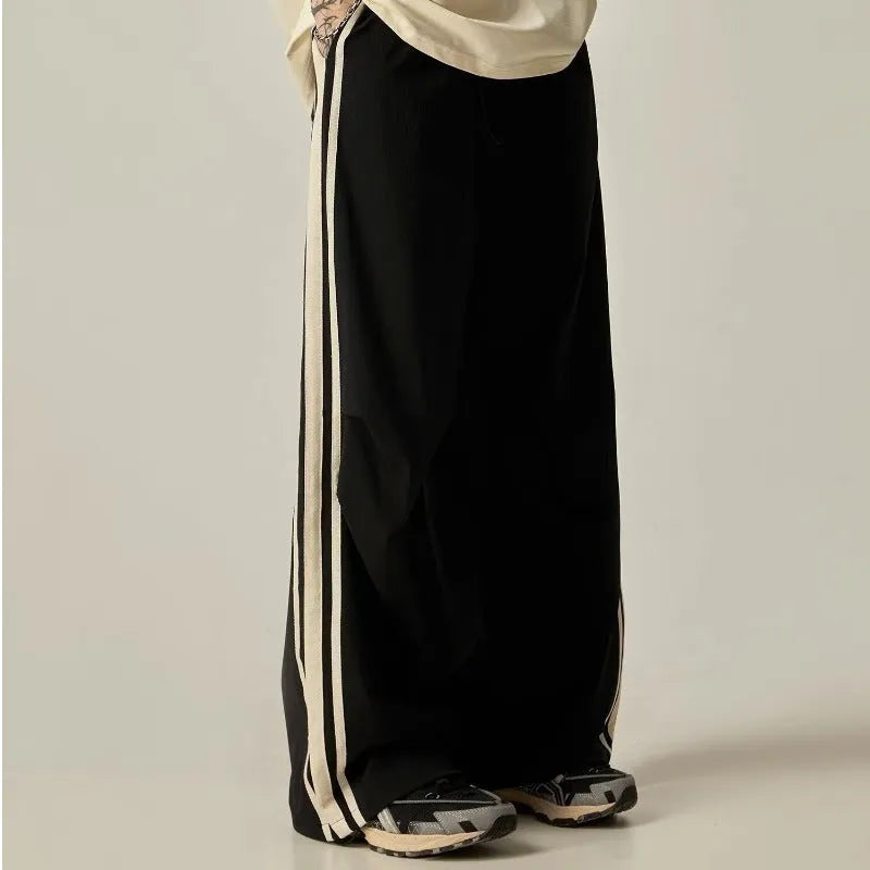 Men's black wide leg climbing trousers with high waist and straight leg design