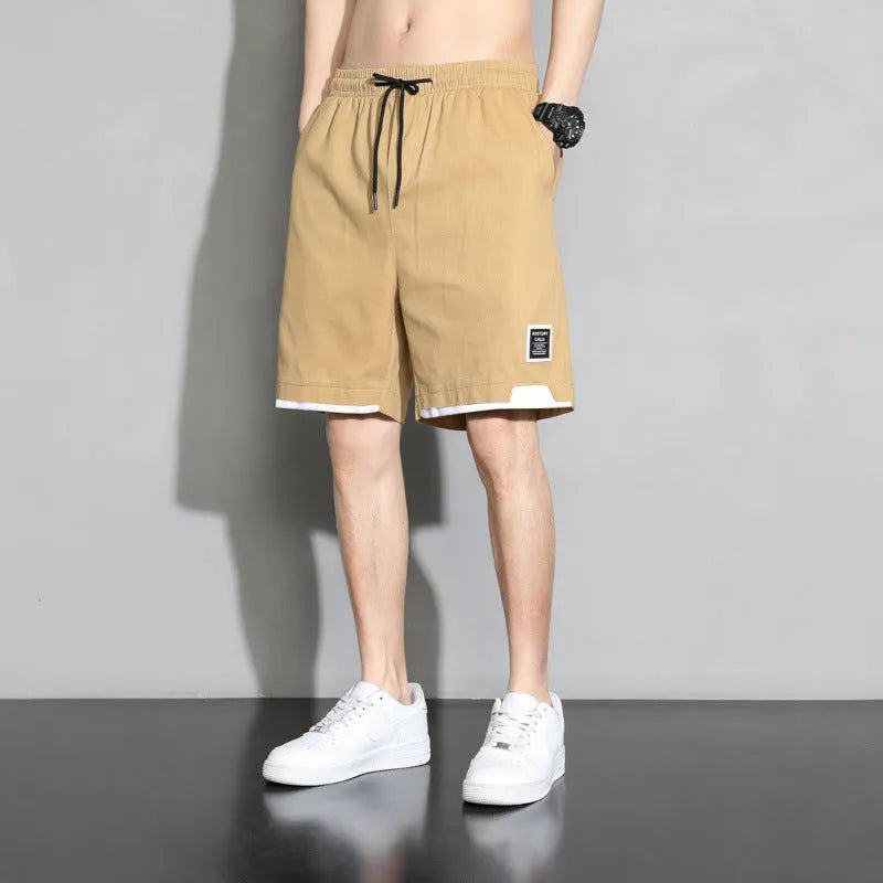 Cotton shorts for boys in black, khaki or white colours with mid waist design and extended sizing options