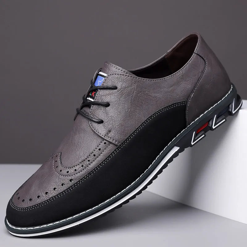 Men's black casual leather slip-on shoe with rubber sole and leather toe cap detail