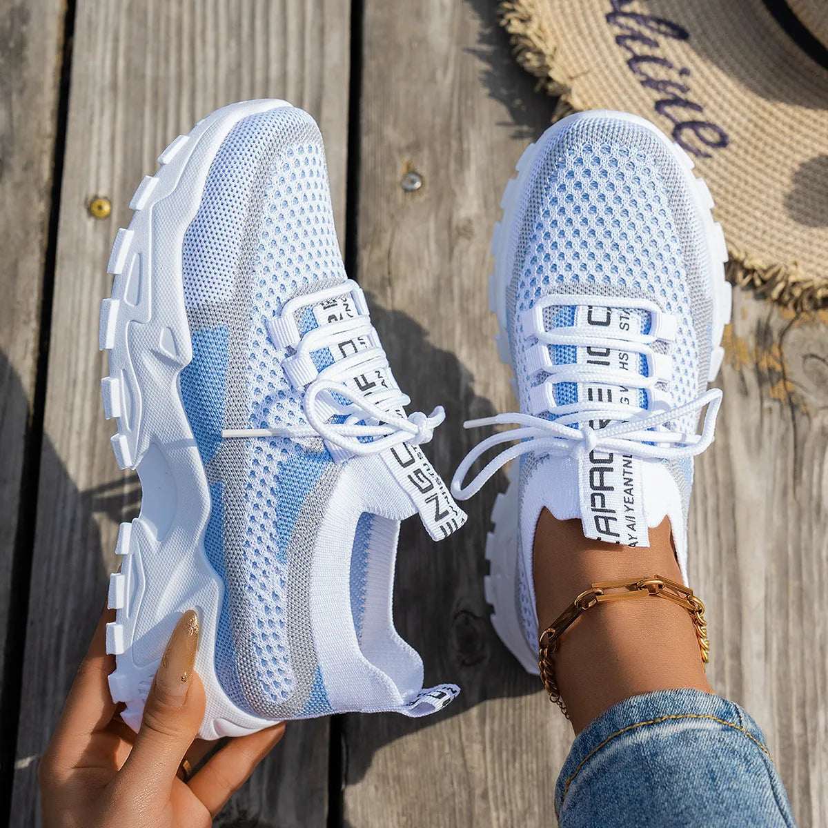 Women's Flyknit mesh lace-up sneakers in multiple colour options with rubber sole