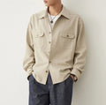 Men's formal shirt with cotton lapel collar in light sand rice colour showing simple profile design