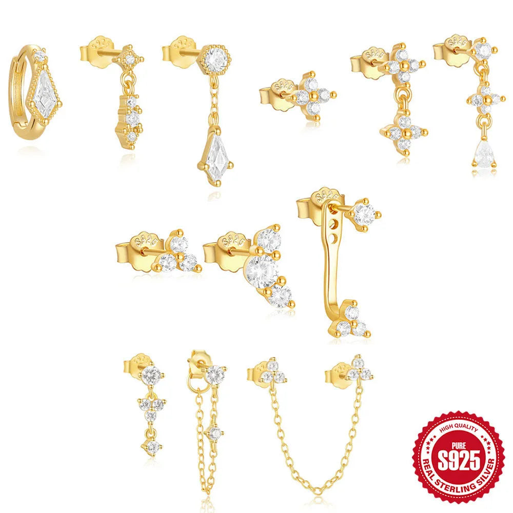 Set of three S925 sterling silver geometric tassel ear studs with zircon details on a plain background.