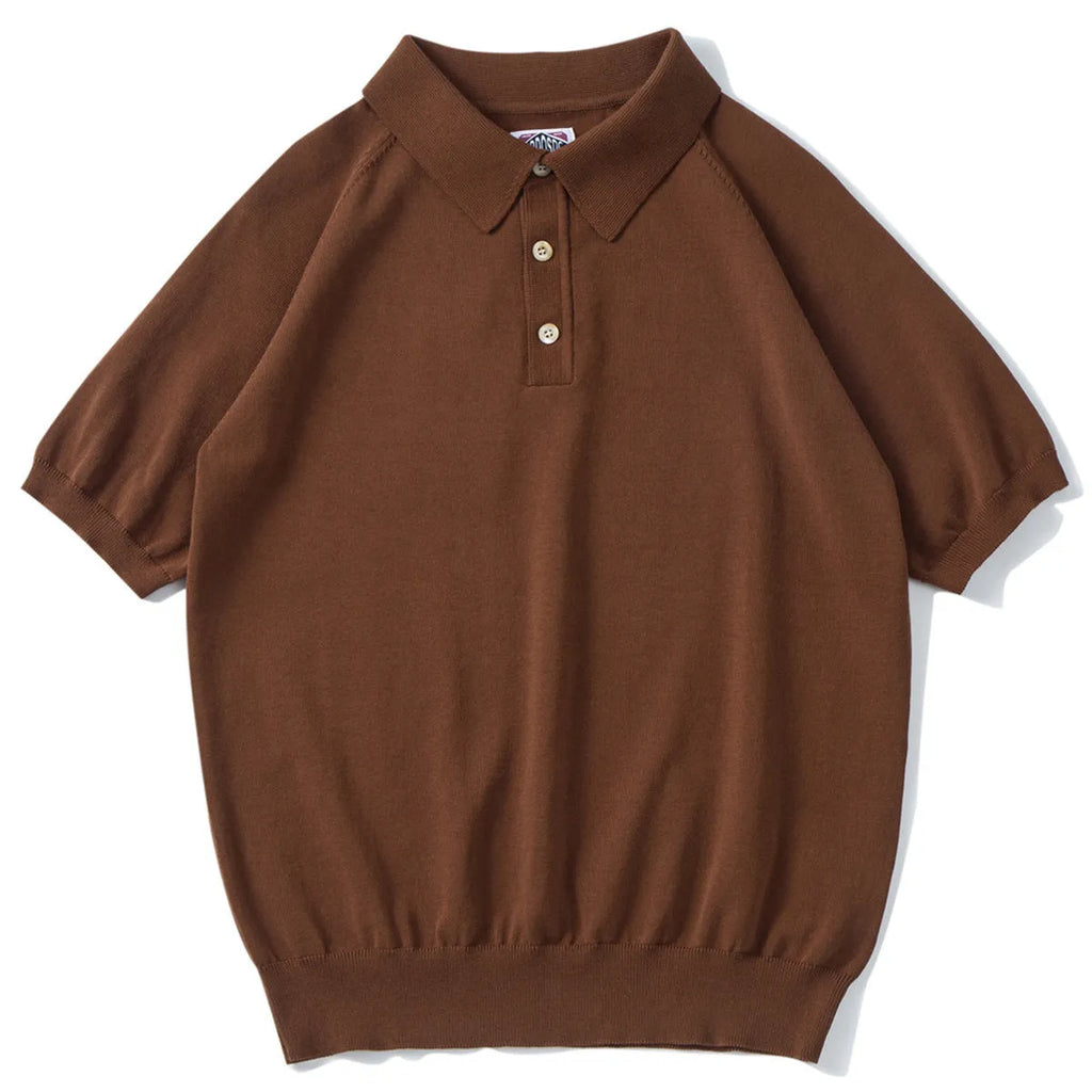 Retro slim-fit short-sleeved cotton T-shirt in a solid colour, shown in a casual setting.