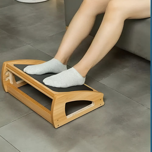 Adjustable bamboo wooden footstool in natural wood colour for office desk use