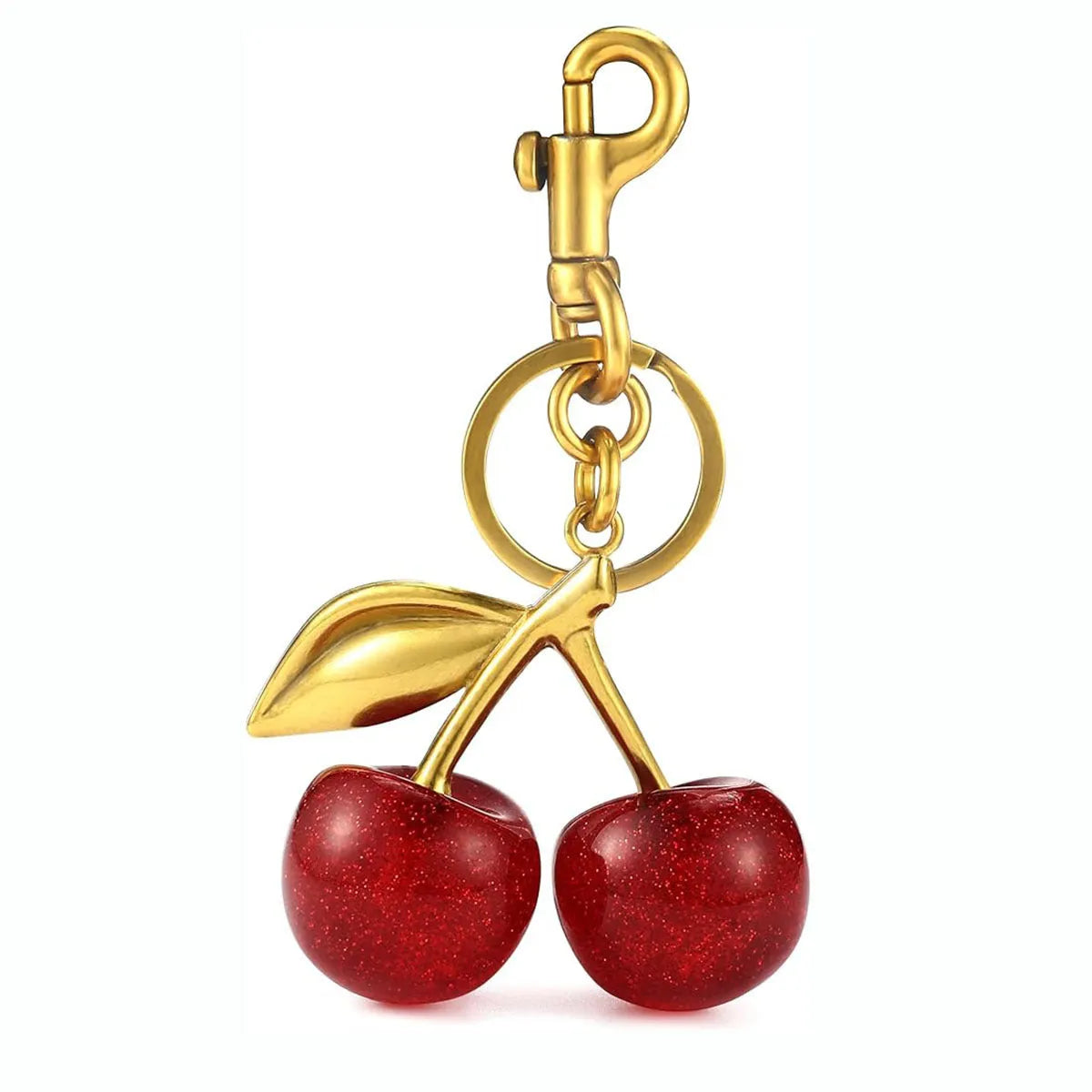 Red zinc alloy three-dimensional cherry pendant charm for key rings and bags.