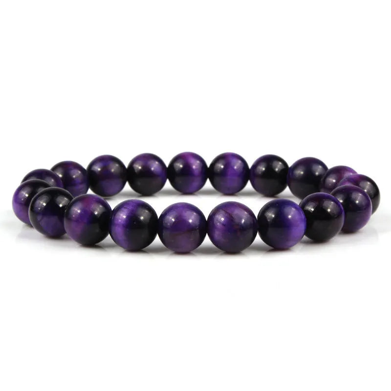 Natural tiger eye crystal beaded bracelet for men and women on a white background.