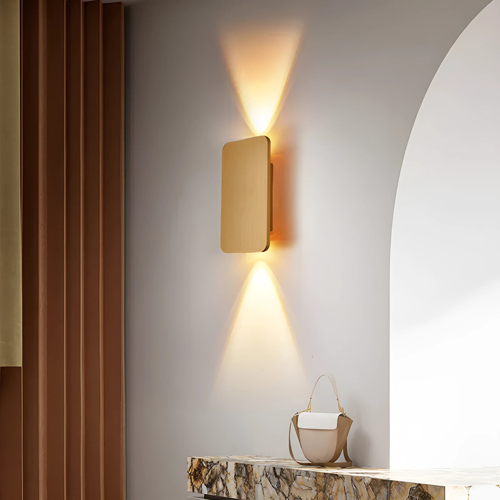 Minimalist modern LED wall lamp in black finish mounted on a wall