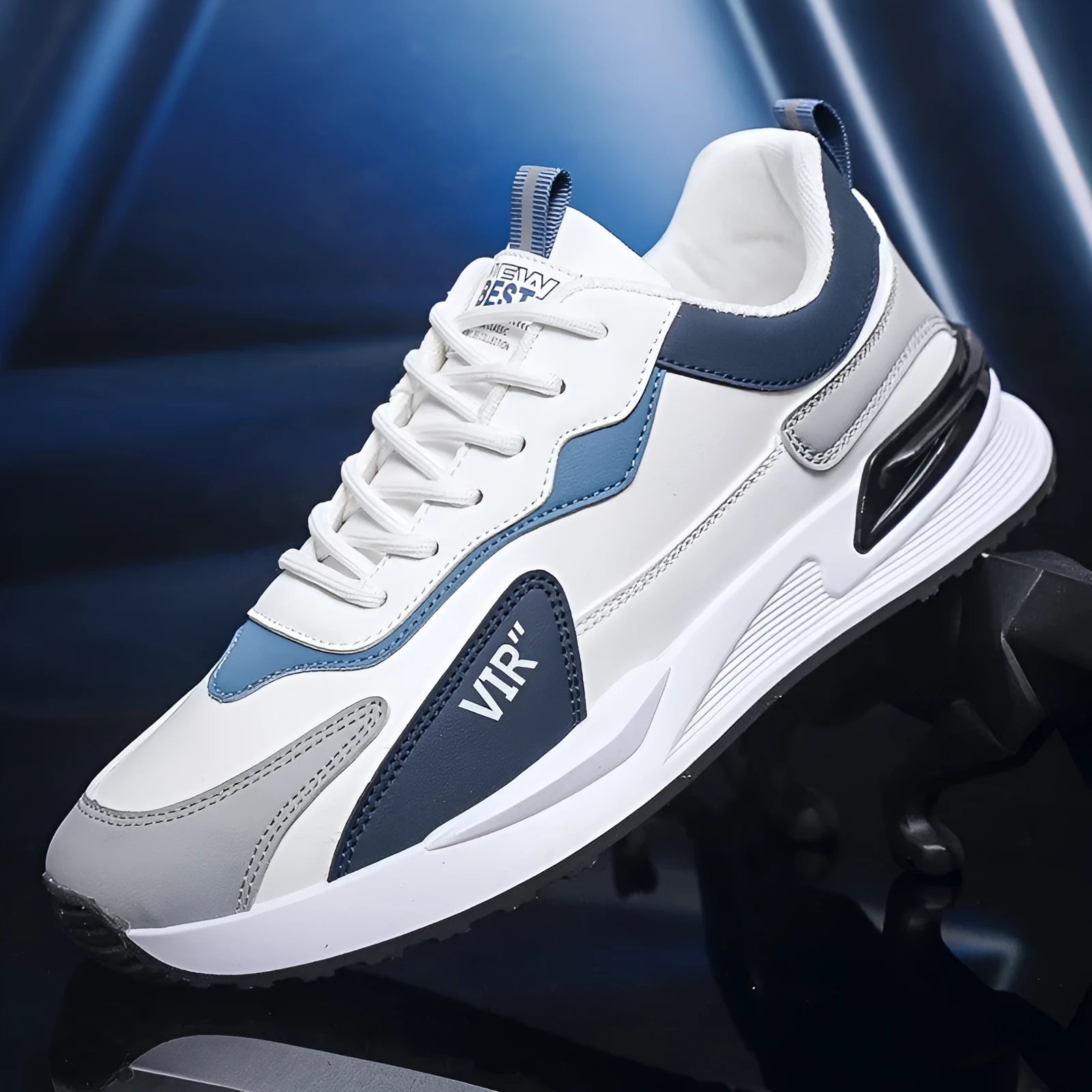 Men's colour block mesh running sneakers in black, grey, and white on a plain background.