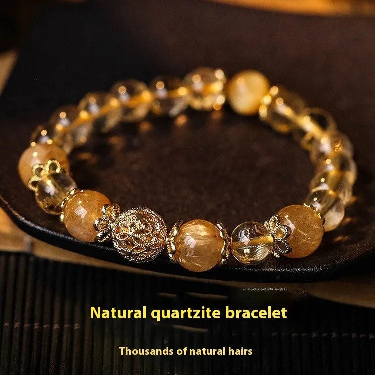 Retro artificial crystal lucky bracelet for women in amethyst gold or yellow gold electroplated finish.