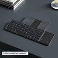 Black folding Bluetooth keyboard collapsed to compact size for mobile phones and tablets