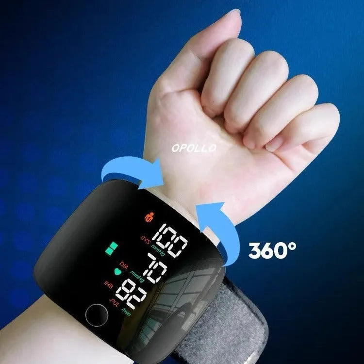 Black wrist sphygmomanometer with digital display and voice prompt buttons for home blood pressure monitoring