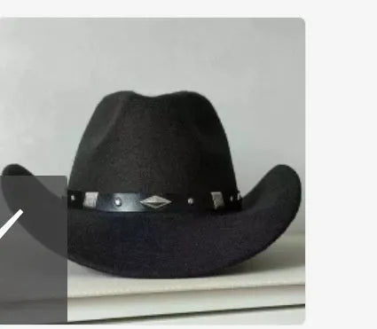 Brown leather velvet cowboy hat with curved brim and conical crown.