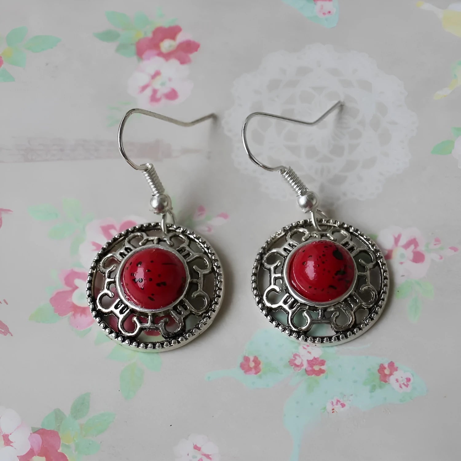Handmade Miao silver turquoise earrings with geometric flower disk design and ethnic patterns