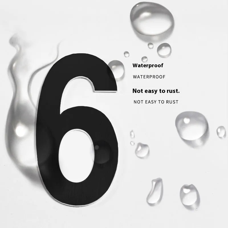 Black stainless steel sticky house number with 7.5cm character on adhesive backing