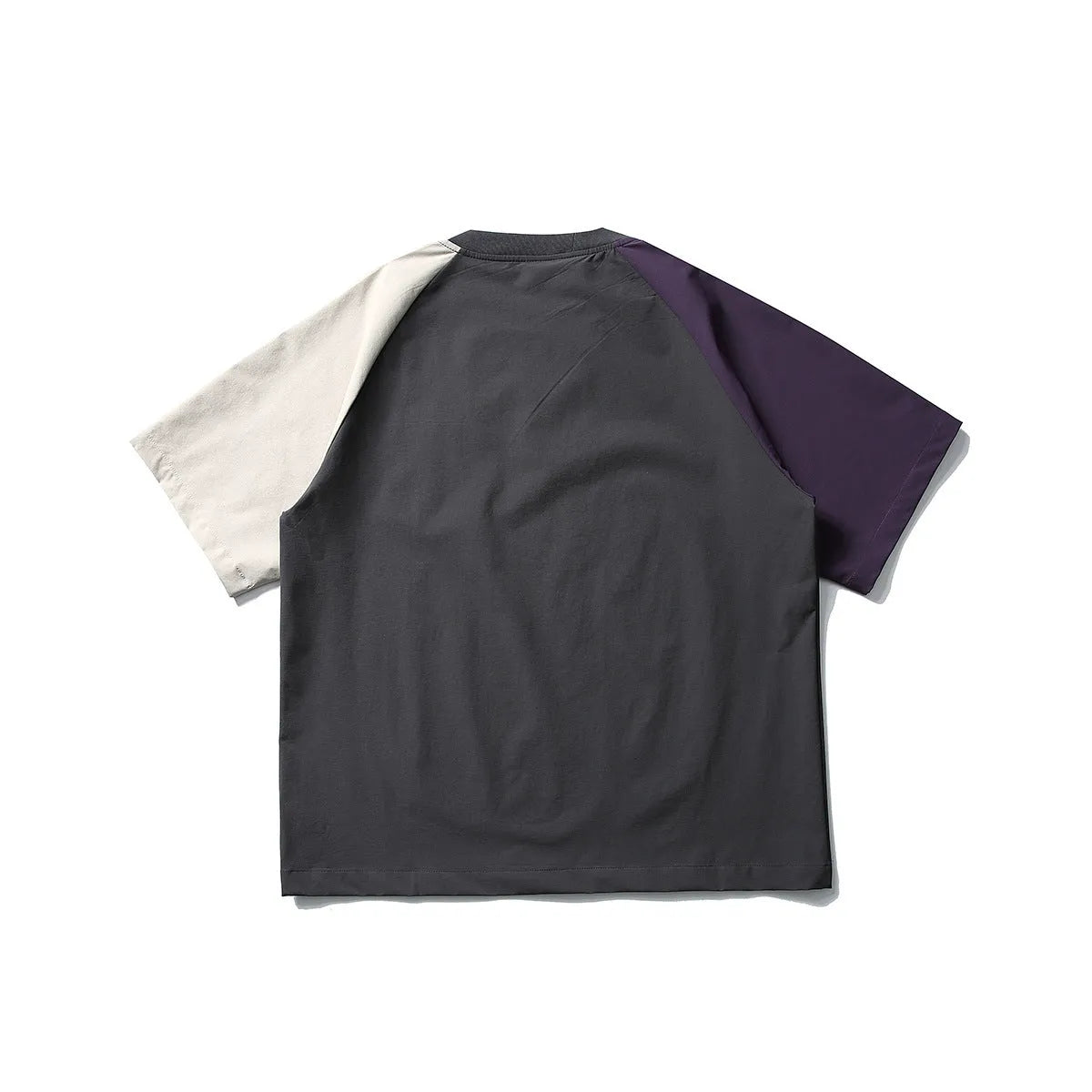 Dark grey men's loose fit T-shirt with contrast colour panels and raglan sleeves.