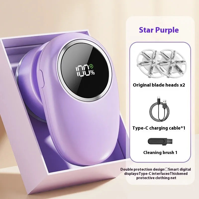 Beige and purple digital fur ball trimmer lint rollers with removable cutter heads on a table.