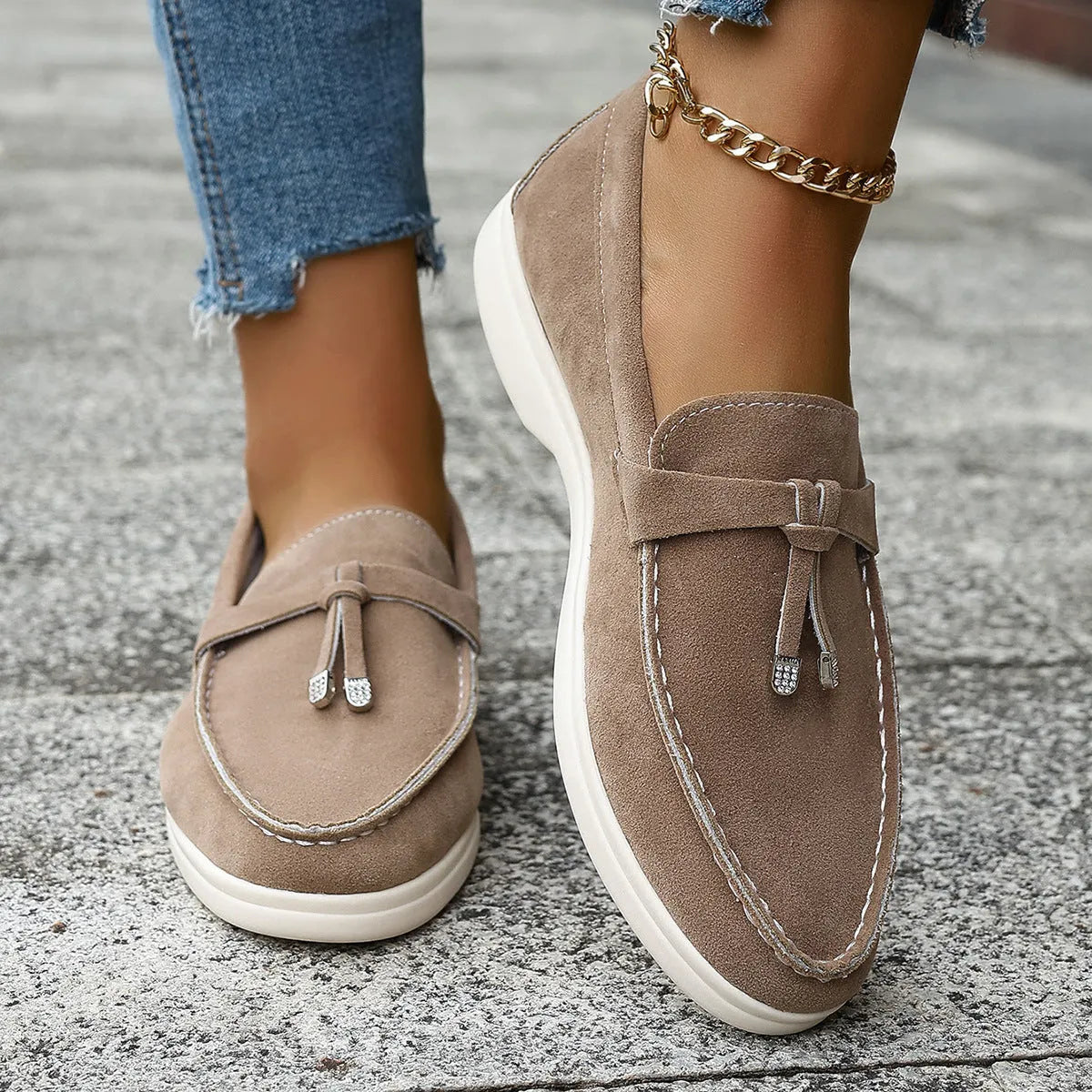 Solid colour canvas Gommino slip-on loafers with a round toe and platform heel on a rubber sole.