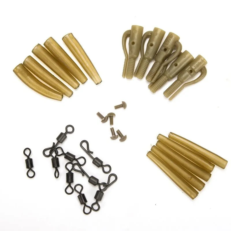 30 piece European carp fishing accessory set with components organised on card