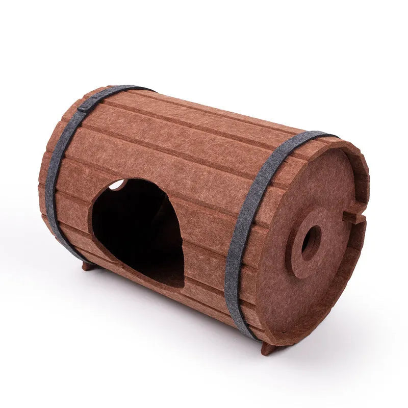 Assembled wine barrel shaped cat bed made from three polyester fibre felt panels with binding straps